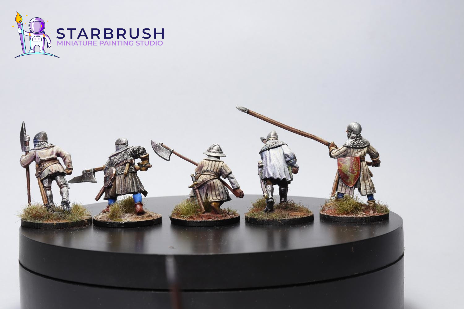 Miniaturas medievales siglos XII–XIV — hombres de armas