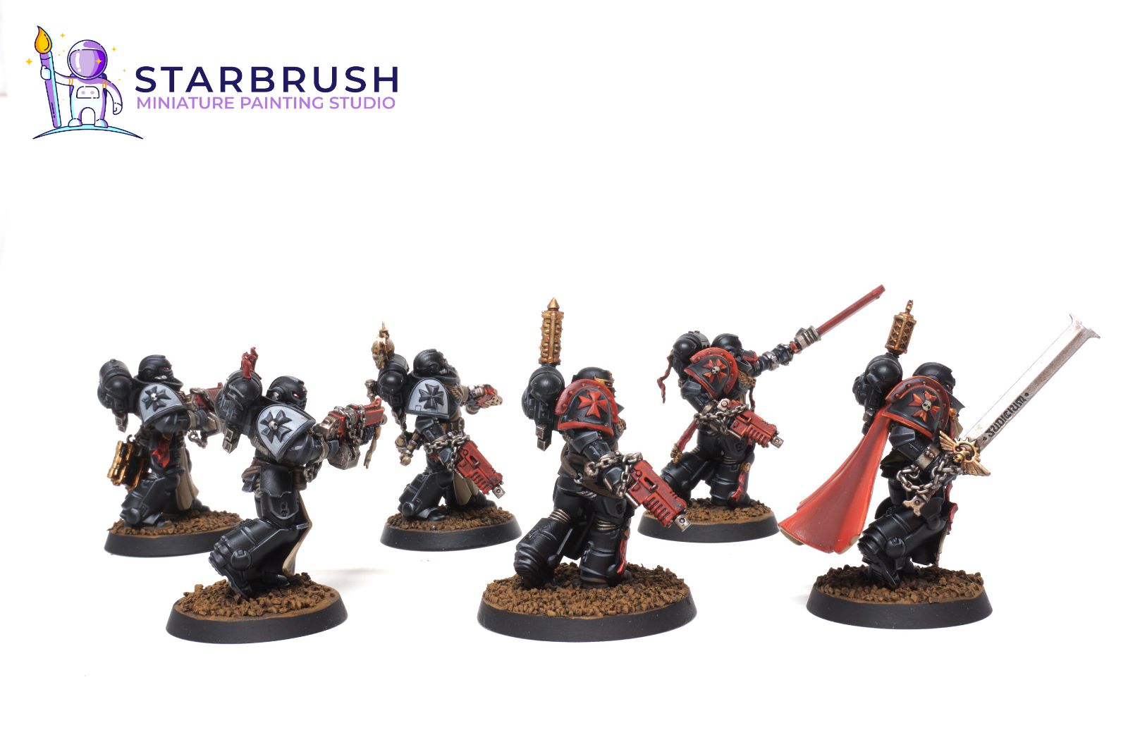 Rear view of the Black Templars Sword Brethren squad showing white Templar crosses and red cloaks painted to Level 1