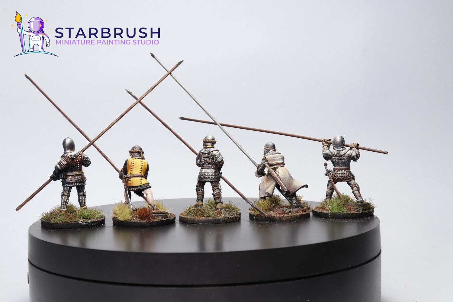 Miniaturas medievales siglos XII–XIV — hombres de armas
