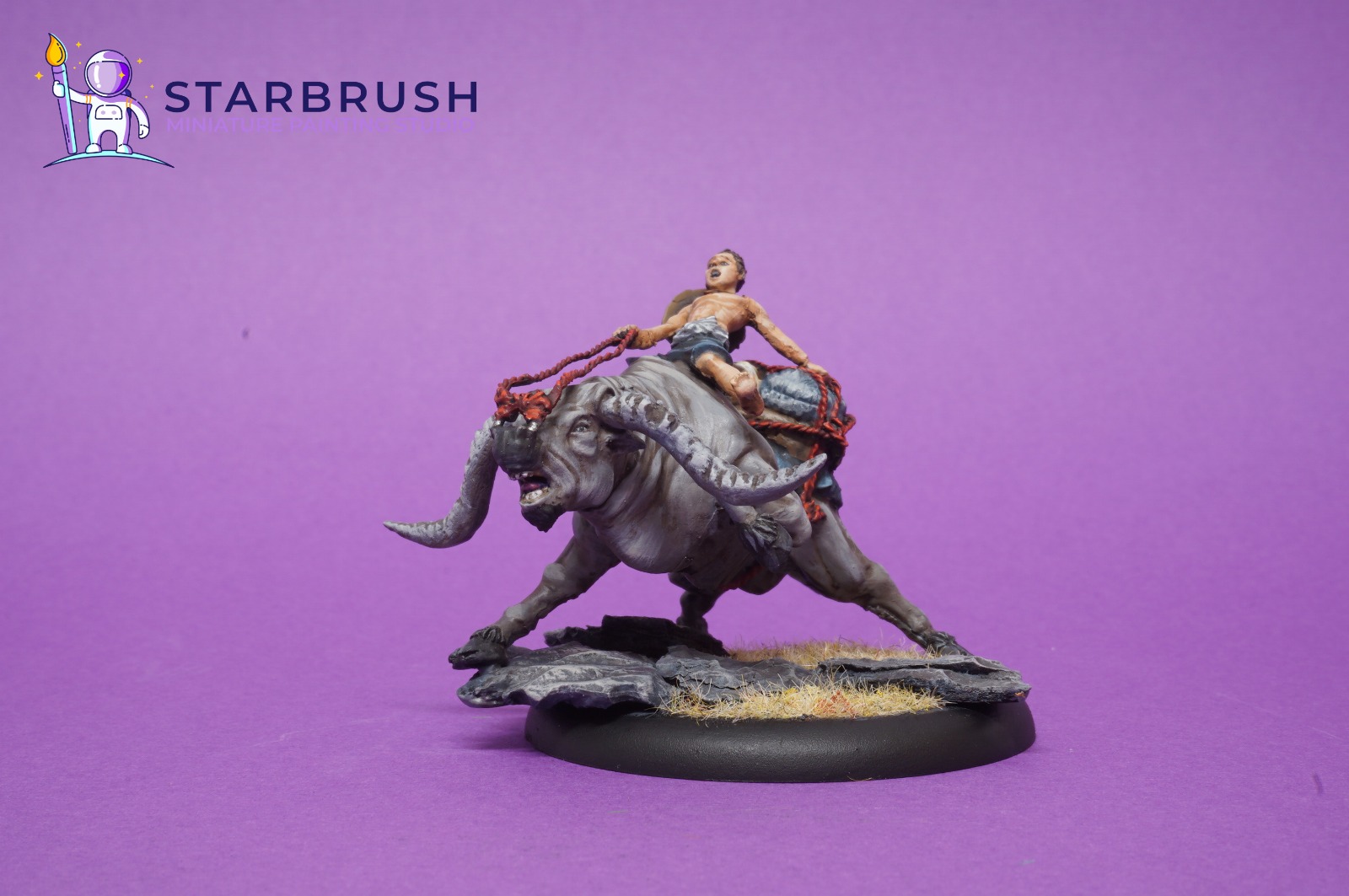 Side view of the Temple of Ro-Kan water buffalo with young rider painted to Level 3 by Starbrush Studio