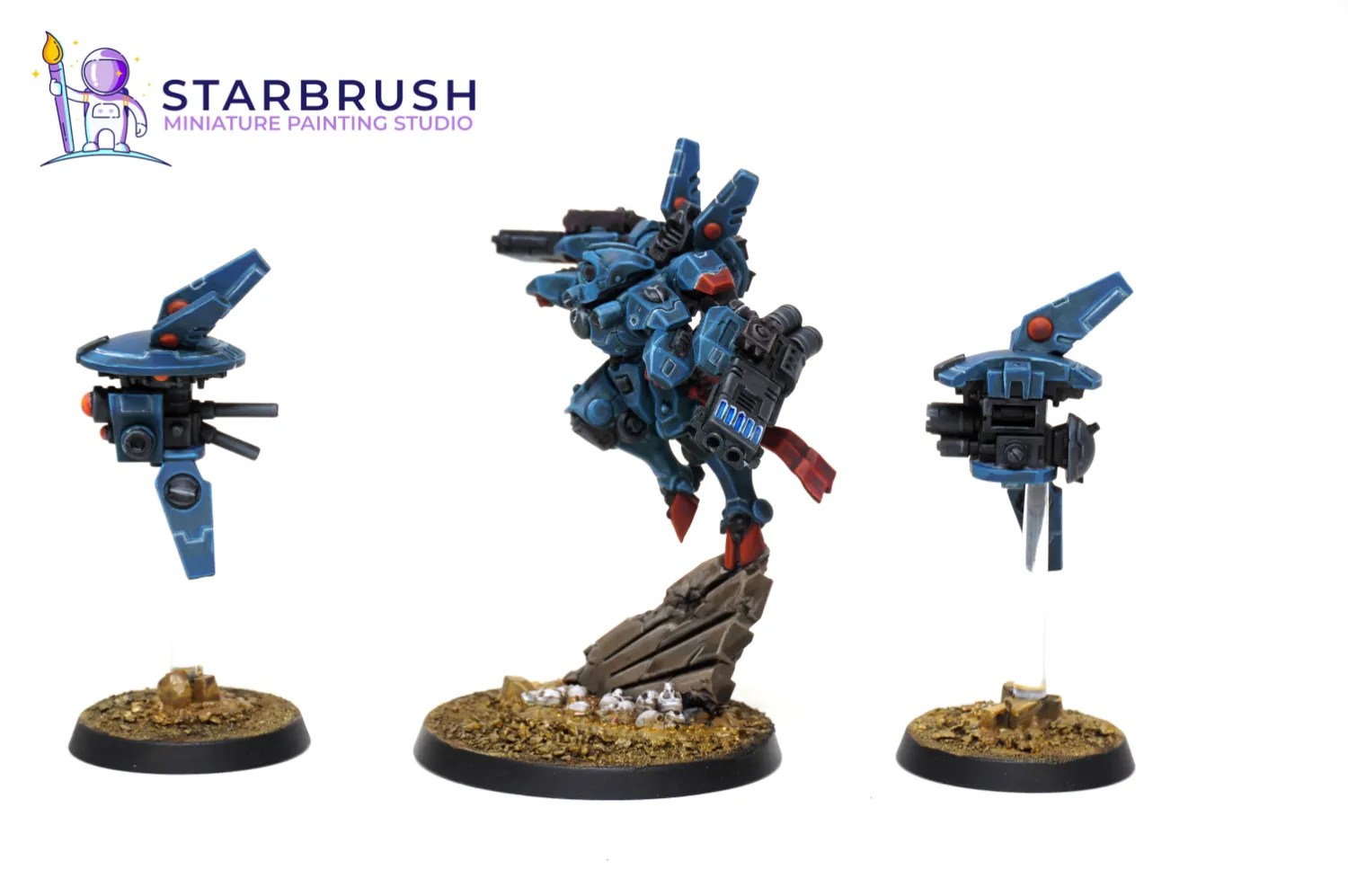 T'au Empire tactical support and command-link drones painted in military blue with bright orange lenses to Level 2