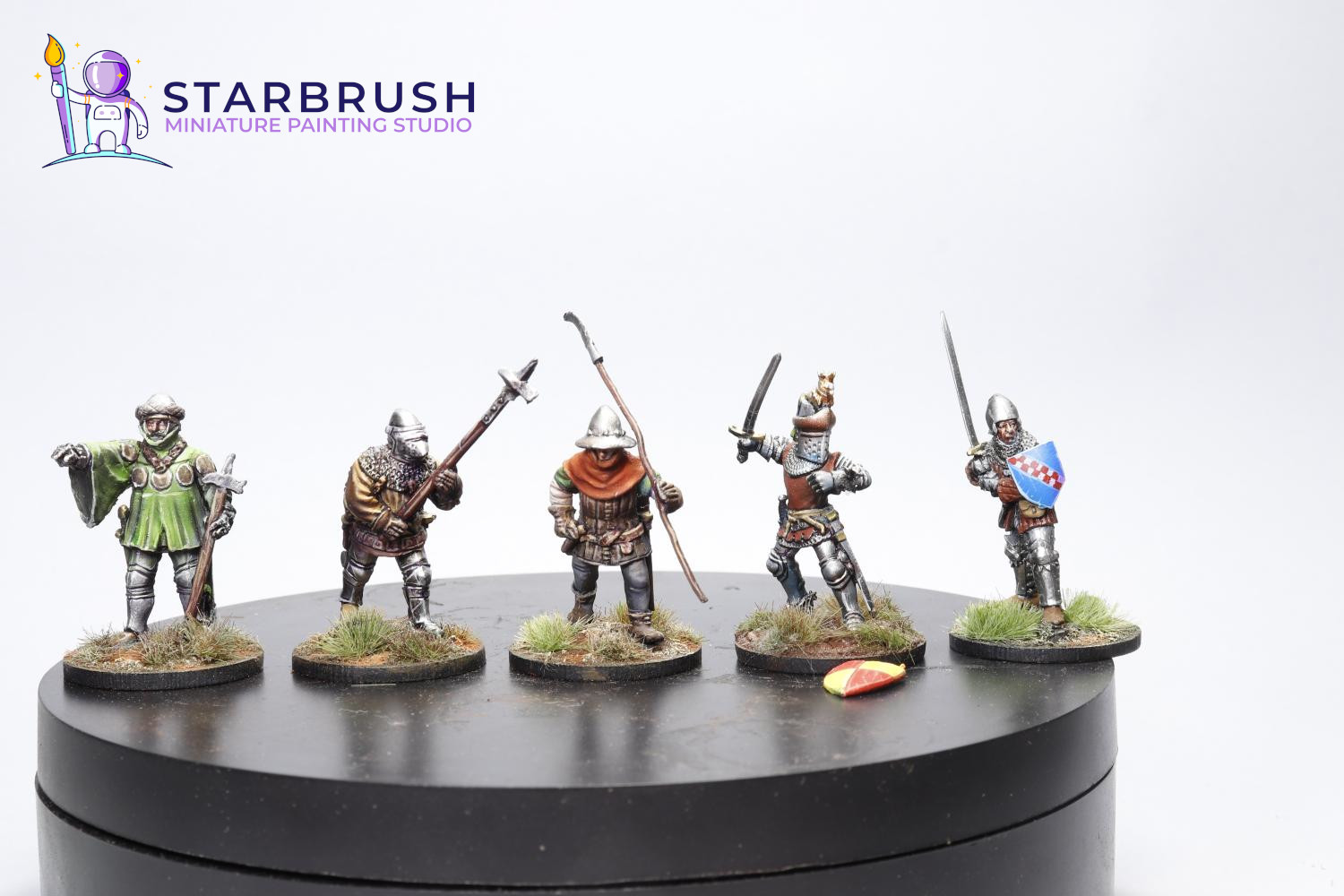 Miniaturas medievales siglos XII–XIV — escudos con freehand heráldico
